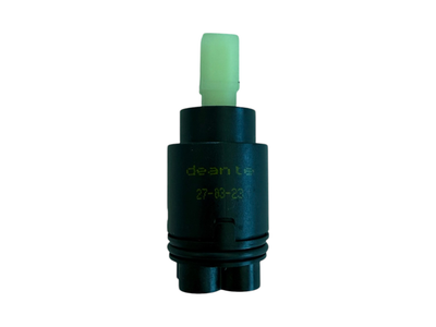 Cartouche céramique Deante 25 mm pour robinet mitigeur BQS Silia, noire avec composant supérieur vert visible.