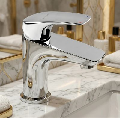 Robinet mitigeur de lavabo chromé Deante Cynia 87 avec bonde clic-clac, design élégant et finition brillante.